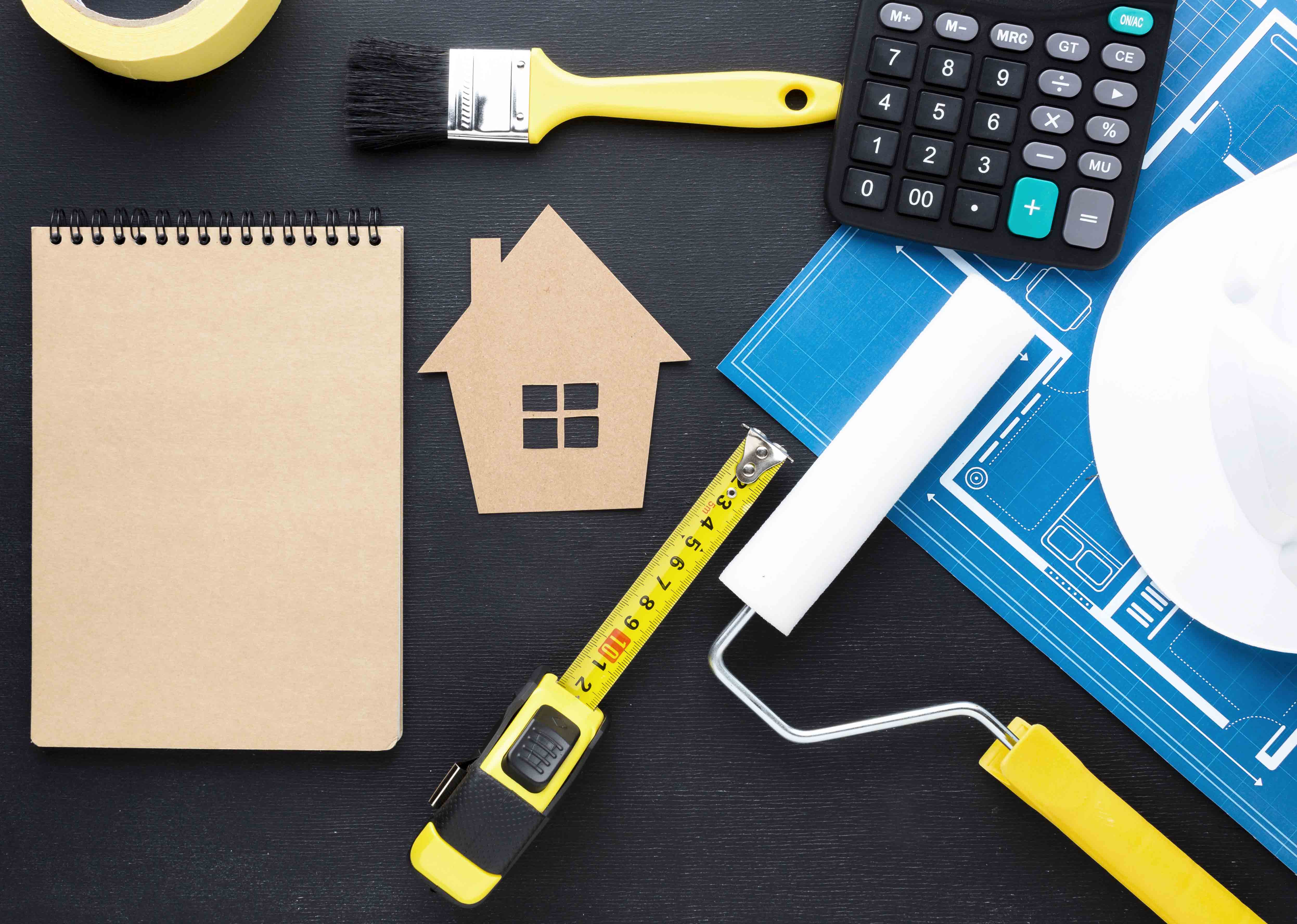 blue-print-house-with-tools-empty-notepad.jpg
